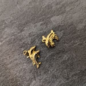 Gold colored dolphin charms